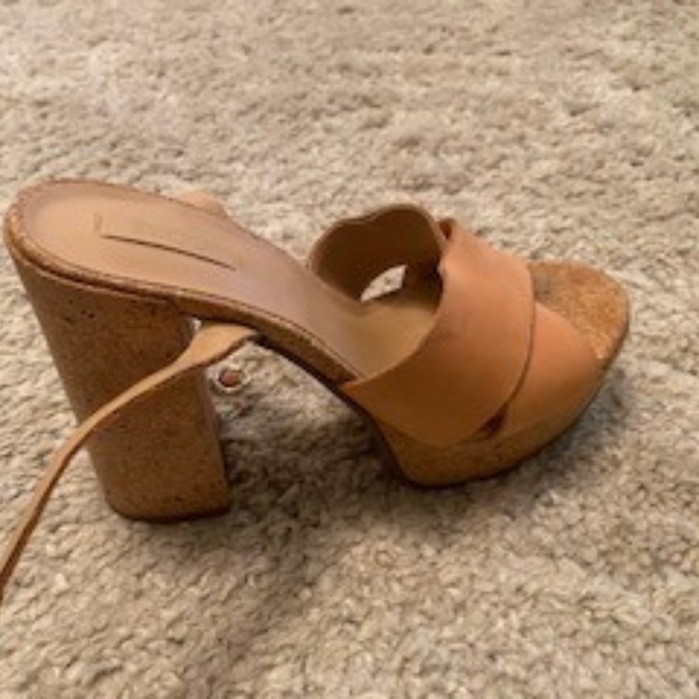 Also, high cork heel, ankle strap, sandals